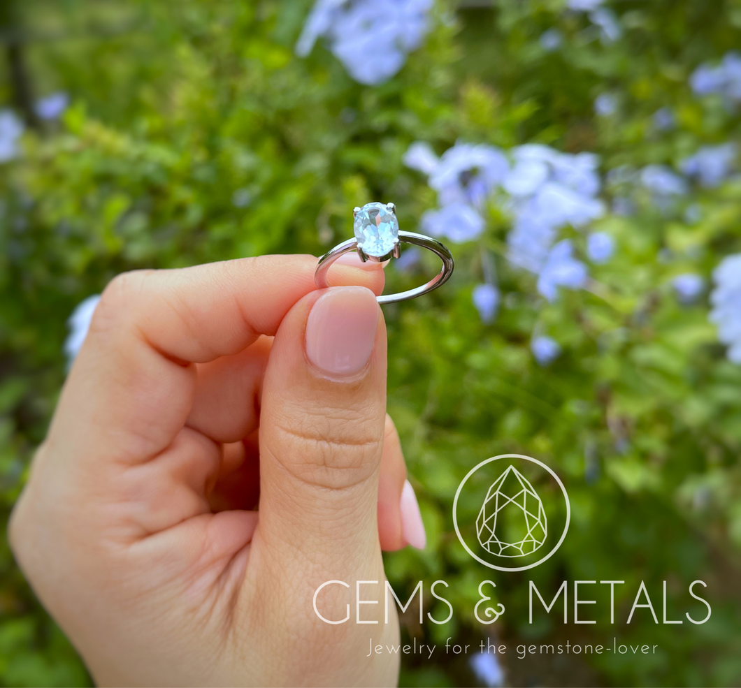 Faceted blue topaz ring